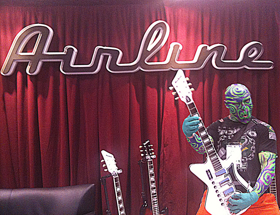 An Alien Stops by the Airline Guitars Booth at Winter NAMM 2011