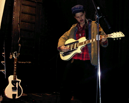 Cole from the Black Lips with his Airline Town & Country guitar