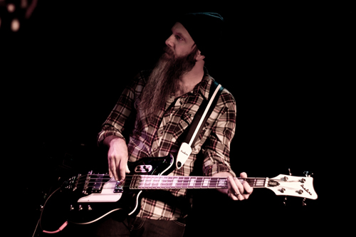 Lex Price (Silver Seas) with the Airline Map Bass Guitar