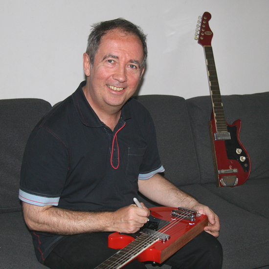 Pete Shelley autographs his signature Starway guitar