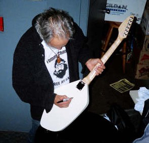 Tommy Chong signing my Eastwood Phantom Guitar