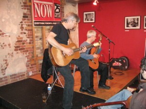 Dr. Dave Walker on stage with Tommy Emmanuel