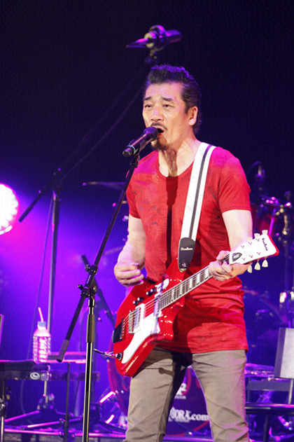 Mr. Uzaki Ryudo with his Airline 2P Guitar (Red)